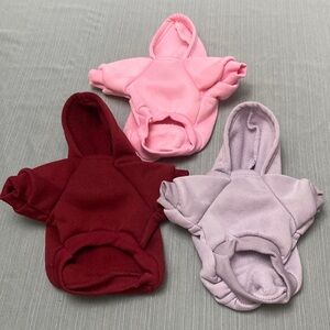 Set of Three Dog Hoodies - Pink, Red, and Lavender made from comfy fleece.
